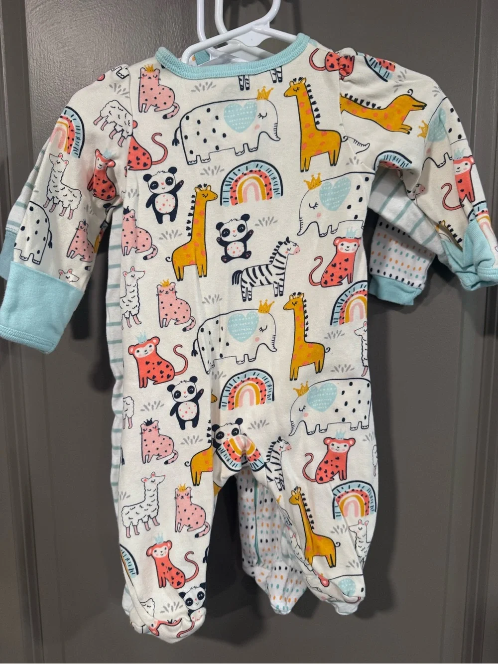 Three piece lot of light weight footed Pajamas, gender neutral.